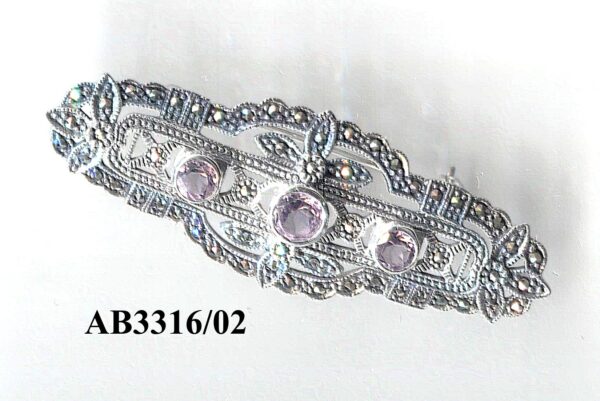Broche en Plata de 1ª Ley (925 mm) con marcasitas y amatista.