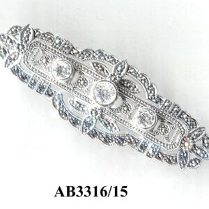 Broche en Plata de 1ª Ley con marcasitas y circonitas incoloras.