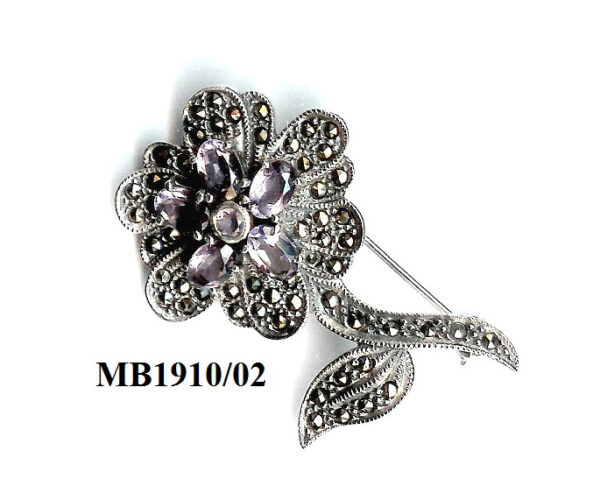Broche de flor en Plata de 1ª Ley (925) con marcasitas y amatistas facetadas.
