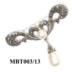 Broche en Plata de 1ª Ley con marcasitas y perlas.