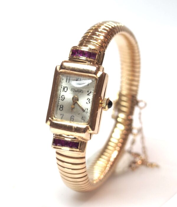Reloj Duward Sra. de oro18kts. con rubíes. Años 50.