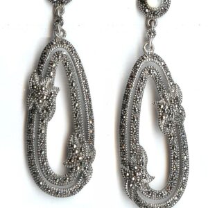 Pendientes con motivos vegetales en Plata de 1ª Ley (925) con marcasitas y nácar. También en ónix.